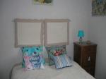 Tte de lit faite de coussins