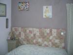 Tte de lit capitonne